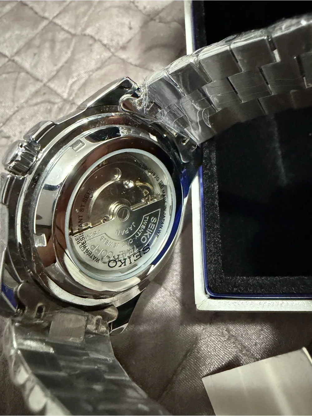 Seiko Stainless Steel Watch with Green Dial and Silver Bezel